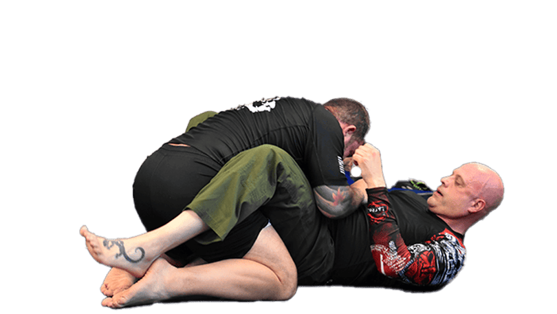 guys rolling in Jiu-Jitsu